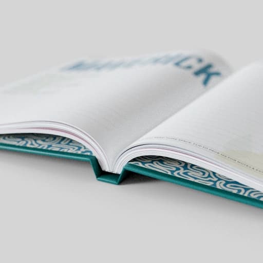 Close view of notebook binding and printed pages