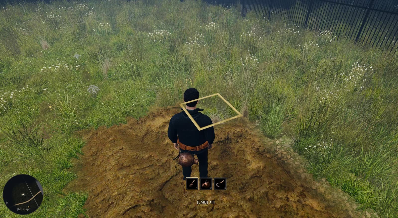 Turning a patch of soil with the hoe, ready to plant